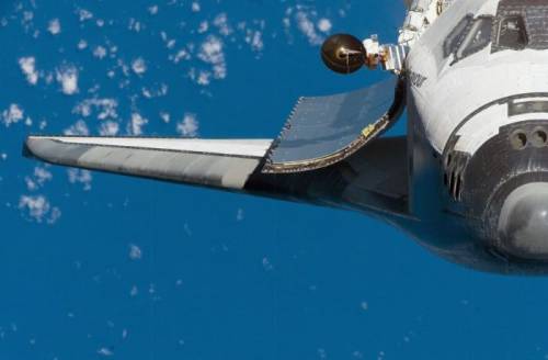 ロマンの宇宙とスペースシャトルの写真